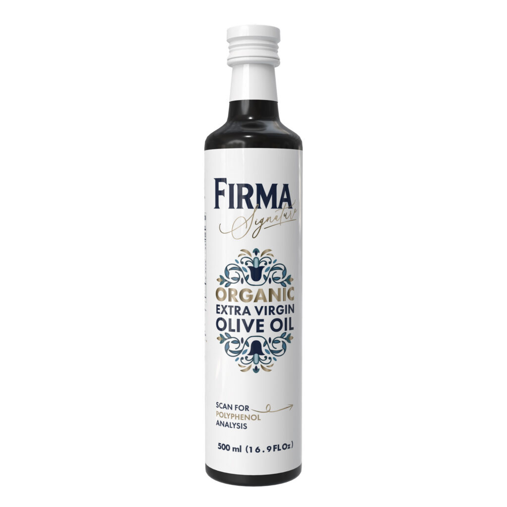 Front-facing product image of a 500 ml FIRMA Signature Organic Extra Virgin Olive Oil bottle. The dark glass bottle features a white cap and a premium white label with the FIRMA Signature logo in navy and gold, blue Mediterranean-inspired ornamental artwork, the text "Organic Extra Virgin Olive Oil," and a note to scan for polyphenol analysis. Displayed on a black background.